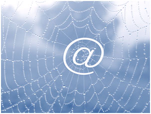 Spinnennetz mit @-Zeichen in der Mitte